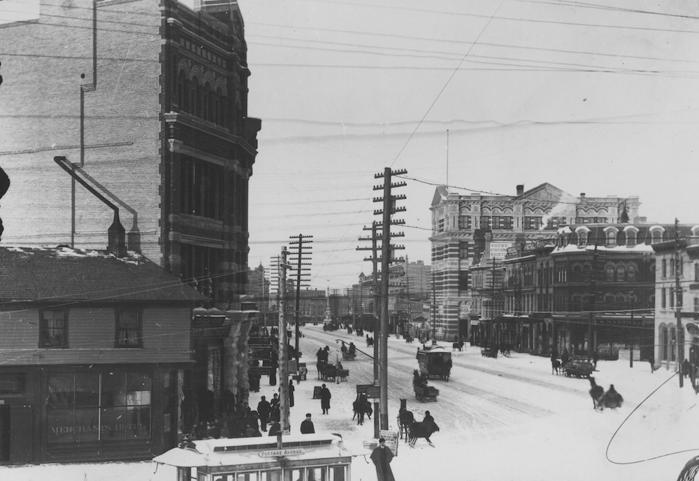 1886 - Winnipeg Street Railway on Portage Avenue in front of Merchants Hotel