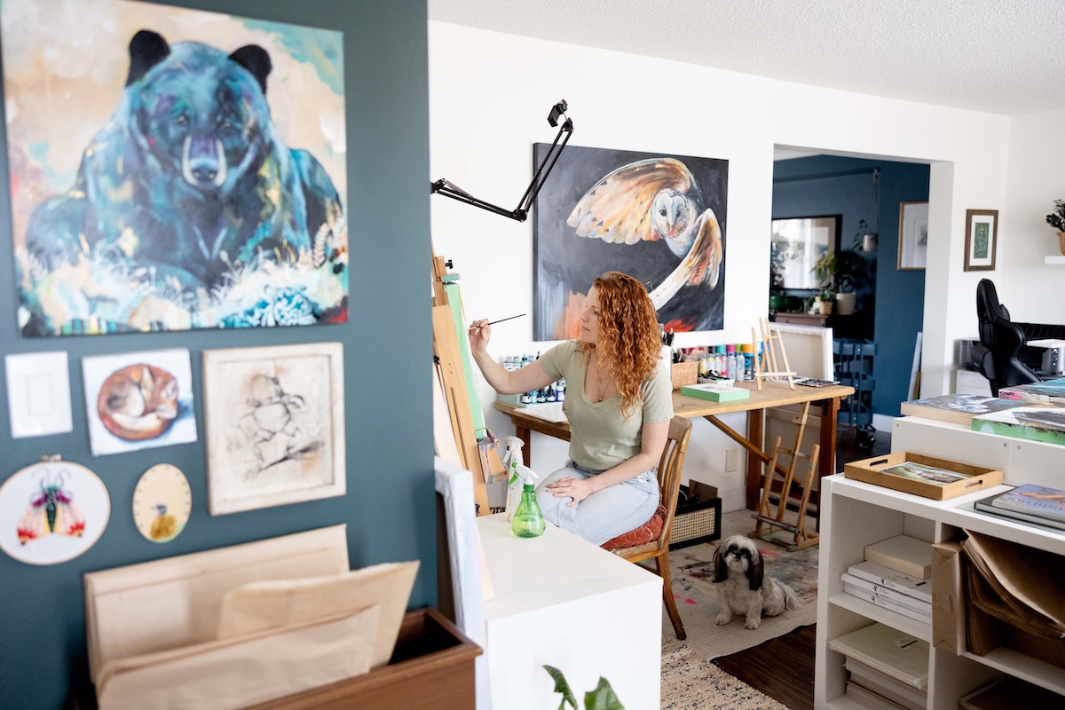 Wildlife Artist Lisa Whitehouse Busy painting in the studio