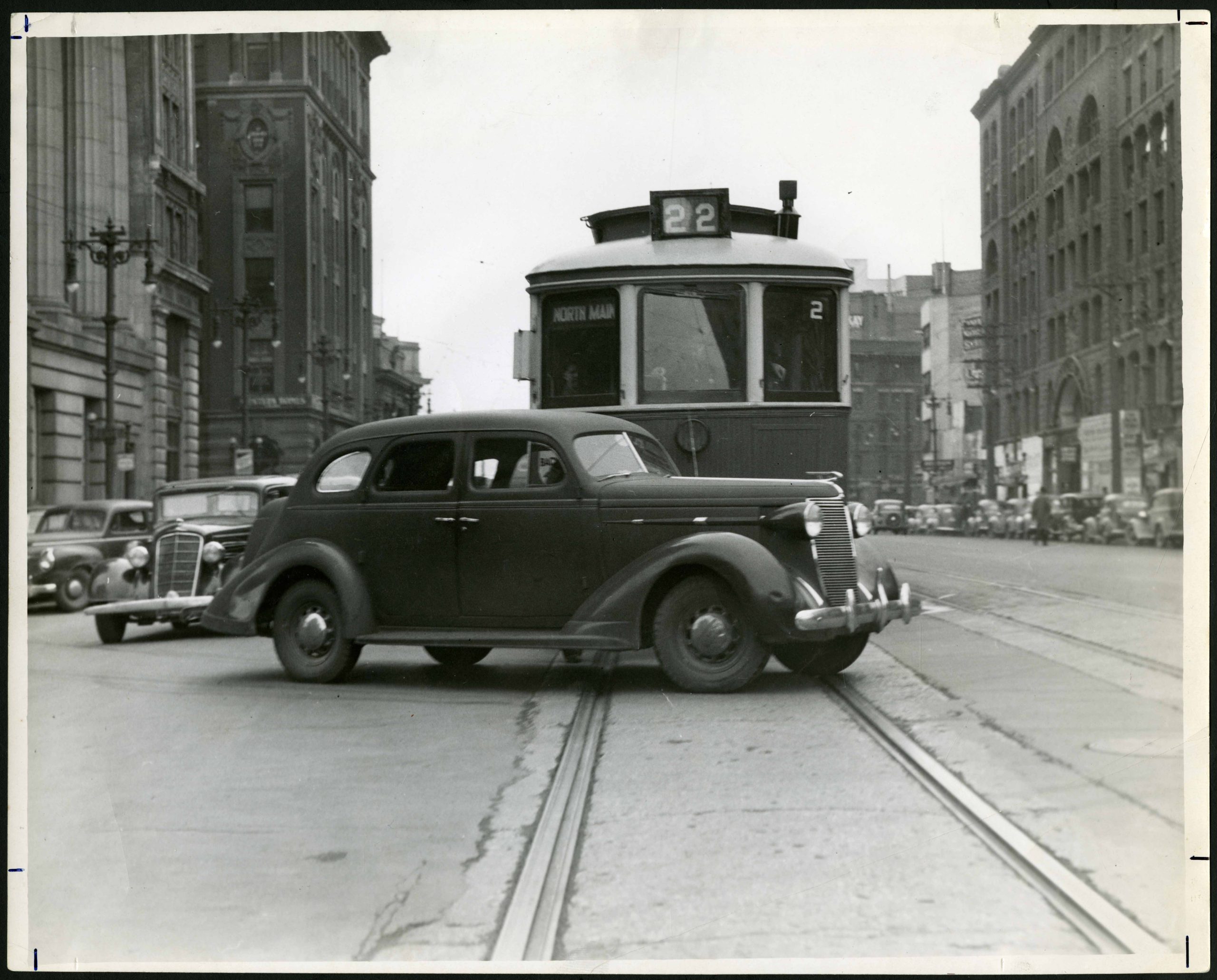 1930?-Car Cuts off Streetcar on Main Street