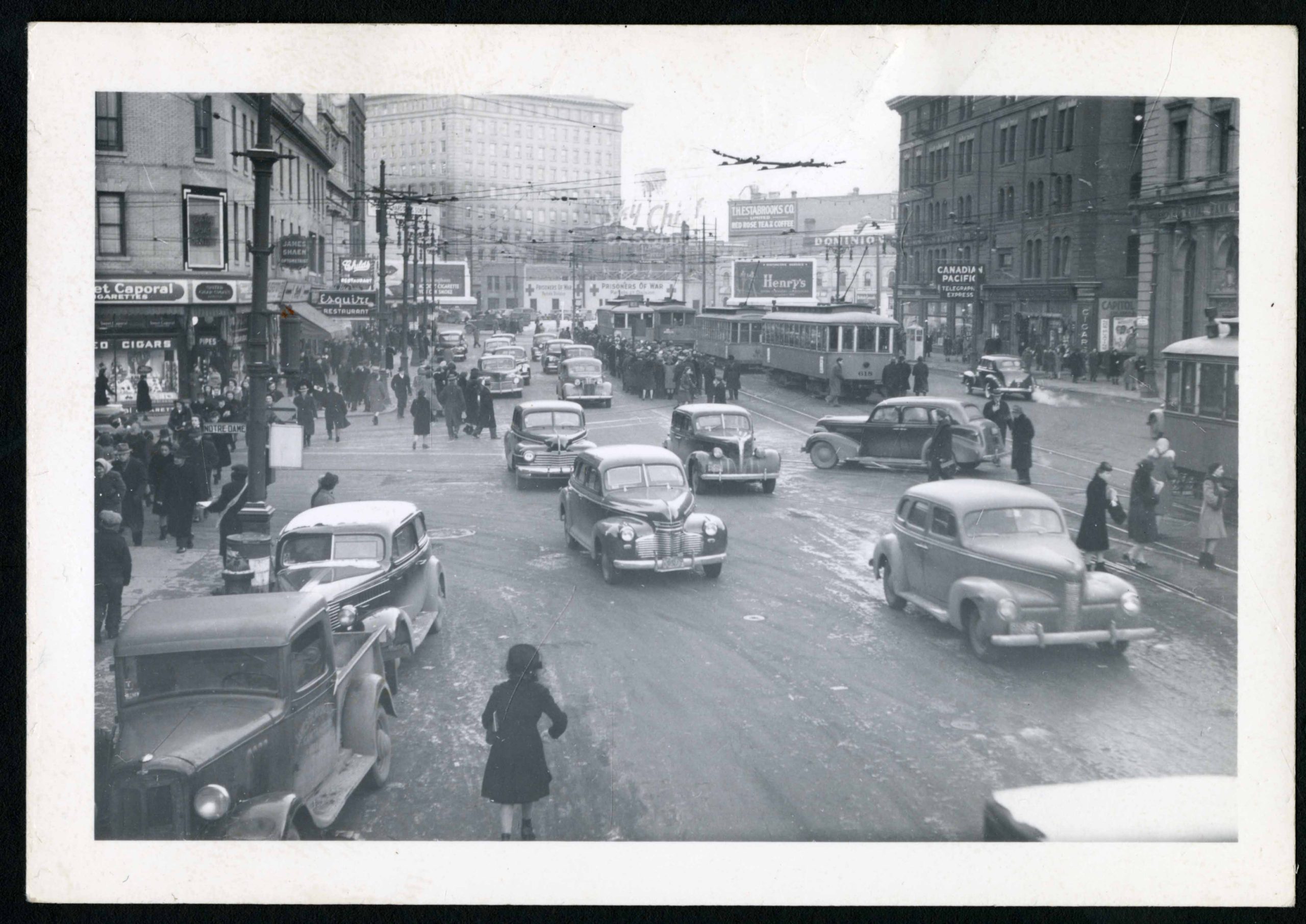 1940?-Notre Dame and Portage Ave. Intersection looking East towards Main St.